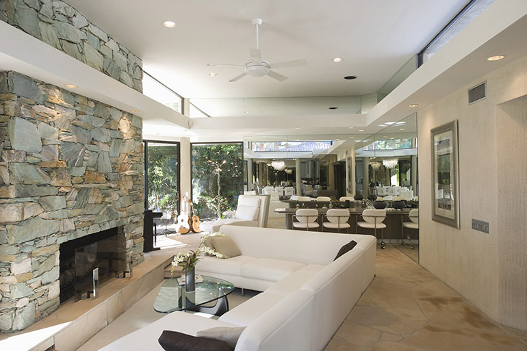 seating area and exposed stone fireplace