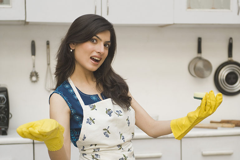 young woman happy after finished cleaning